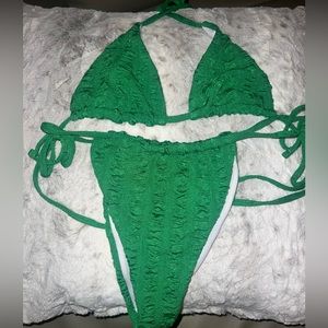 Green triangle top bikini with geometric pattern